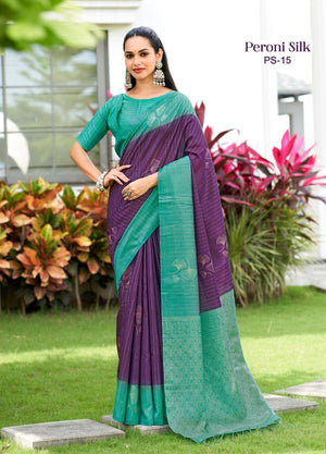 Woman wearing a purple and green saree with Peroni Silk branding in an outdoor setting.