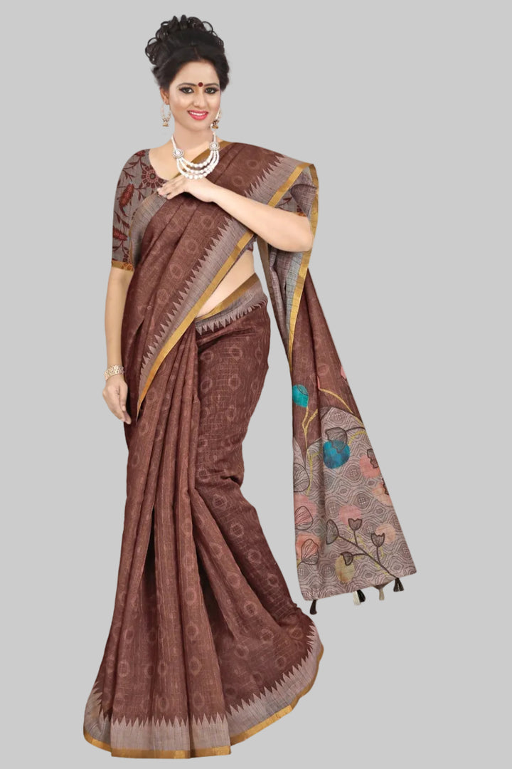 Woman wearing a brown saree with a plant in the background, featuring the brand 'Pannalakshmi'.